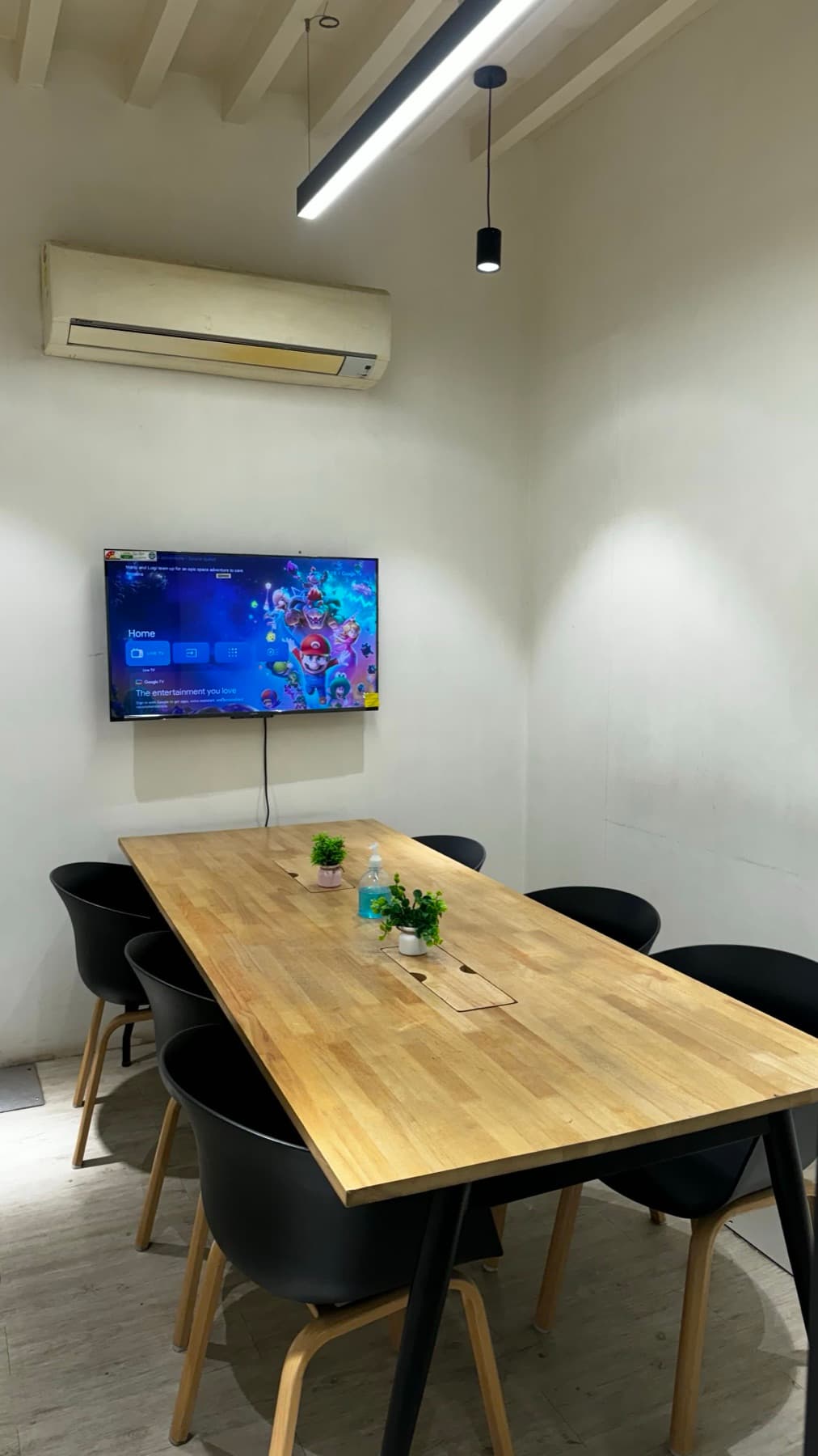 Conference table and chairs at Blue Co-Labs