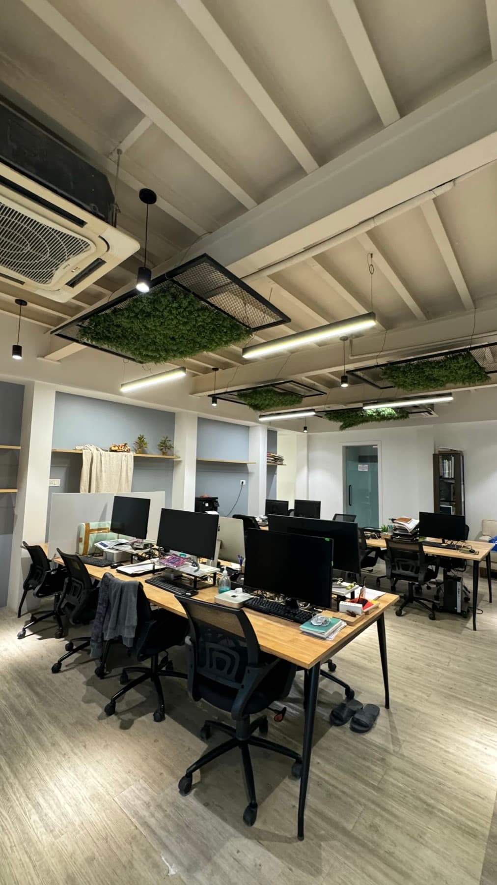 Shared workspace with individual desks at Blue Co-Labs