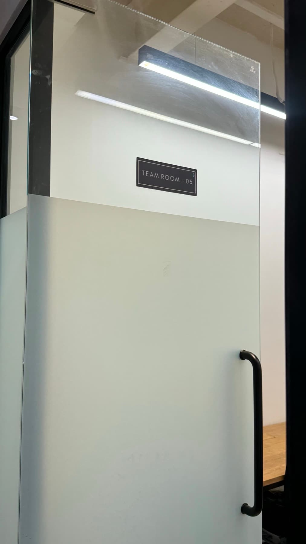 Glass entrance to a team room